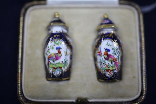 A pair of Royal Worcester miniature hexagonal scale blue jars and covers, c.1910, height 3.5cm, in a fitted case